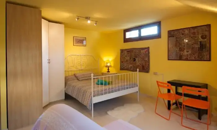 Rexer-SaintPierre-Luminosa-mansarda-mq-a-SaintPierre-CAMERA-DA-LETTO