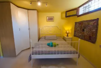 Rexer-SaintPierre-Luminosa-mansarda-mq-a-SaintPierre-CAMERA-DA-LETTO