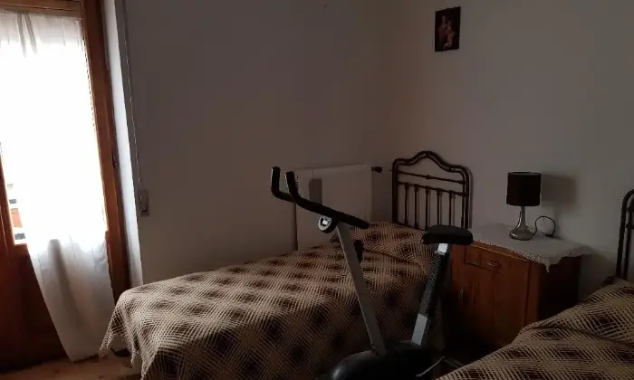 Rexer-Spezzano-della-Sila-Appartamento-nel-centro-di-camigliatello-silano-CAMERA-DA-LETTO