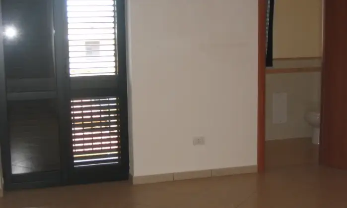 Rexer-Marcianise-Luminoso-attico-CAMERA-DA-LETTO