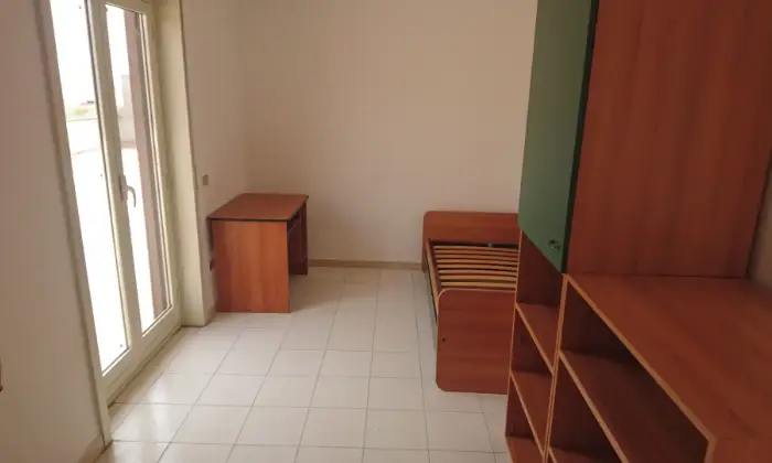 Rexer-Caltanissetta-Appartamento-con-terrazzo-panoramico-in-centro-CAMERA-DA-LETTO
