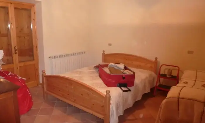 Rexer-Rocca-di-Mezzo-Casa-in-montagna-CAMERA-DA-LETTO