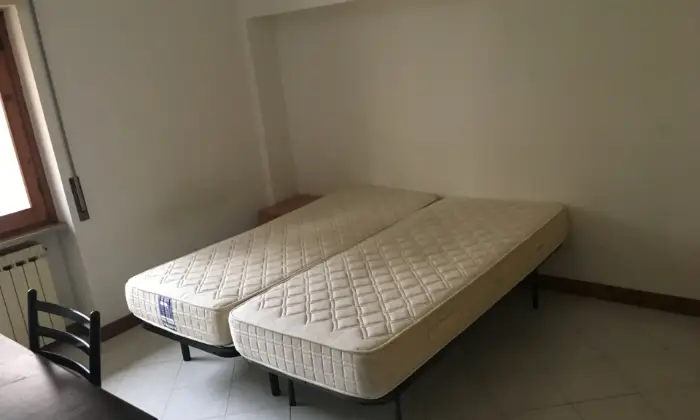 Rexer-LAquila-Appartamento-in-viale-della-croce-rossa-CAMERA-DA-LETTO