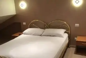 Rexer-LAquila-Mansarda-bilocale-arredata-santa-barbara-CAMERA-DA-LETTO