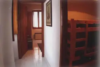 Rexer-Pescasseroli-Centralissima-quadrilocale-camino-CAMERA-DA-LETTO