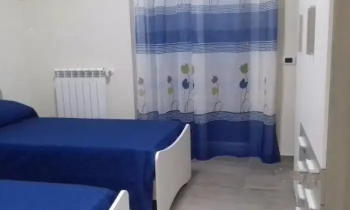 Rexer-Napoli-Appartamenti-Napoli-CAMERA-DA-LETTO