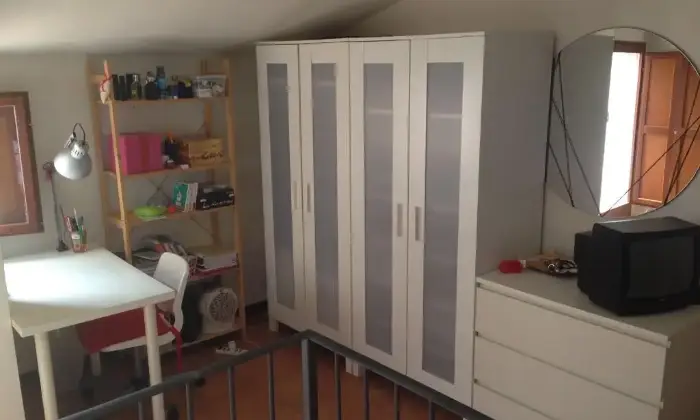 Rexer-Siena-Camera-singola-in-mansarda-CAMERA-DA-LETTO