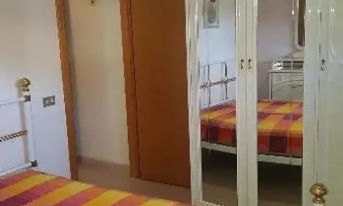 Rexer-GiardiniNaxos-Appartamento-a-recanati-CAMERA-DA-LETTO