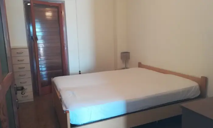 Rexer-Ladispoli-Residence-con-piscina-CAMERA-DA-LETTO