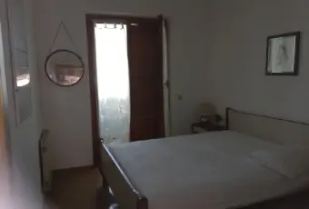 Rexer-Ladispoli-Residence-con-piscina-CAMERA-DA-LETTO