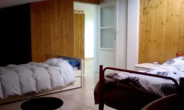 Rexer-Trento-Mansarda-in-centro-storico-a-trento-CAMERA-DA-LETTO