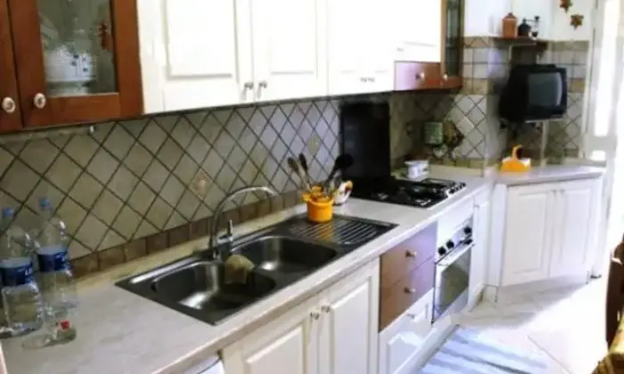 Rexer-Aci-Castello-IN-AFFITTO-Appartamento-vani-e-mezzo-CUCINA