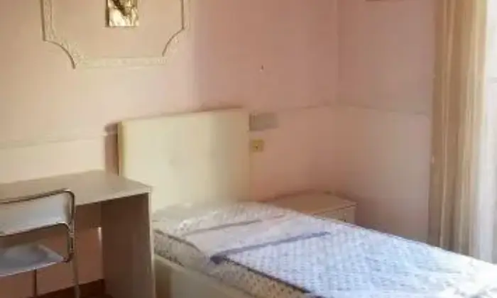 Rexer-Roma-Camera-doppia-due-posti-letto-euro-a-posto-letto-CAMERA-DA-LETTO