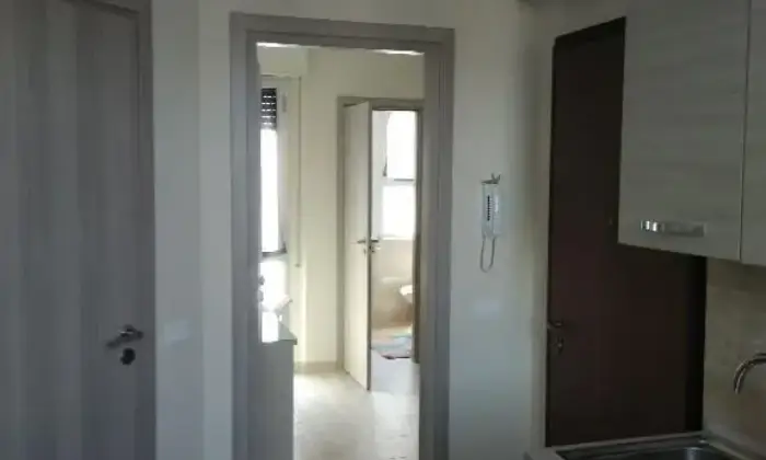 Rexer-Pisa-Camera-con-bagno-privato-Piazza-Guerrazzi-CUCINA