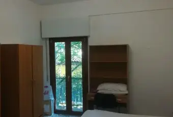 Rexer-LAquila-Stanza-doppia-in-appartamento-in-centro-a-LAquila-CAMERA-DA-LETTO