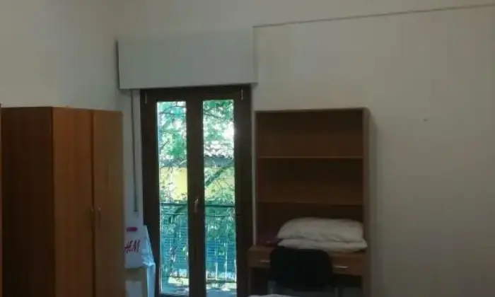 Rexer-LAquila-Stanza-doppia-in-appartamento-in-centro-a-LAquila-CAMERA-DA-LETTO