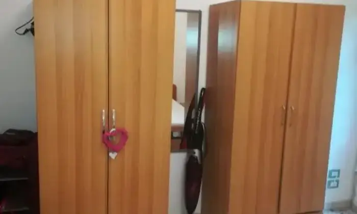 Rexer-LAquila-Stanza-doppia-in-appartamento-in-centro-a-LAquila-CAMERA-DA-LETTO