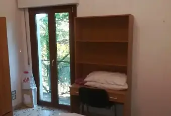 Rexer-LAquila-Stanza-doppia-in-appartamento-in-centro-a-LAquila-CAMERA-DA-LETTO