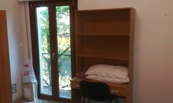 Rexer-LAquila-Stanza-doppia-in-appartamento-in-centro-a-LAquila-CAMERA-DA-LETTO