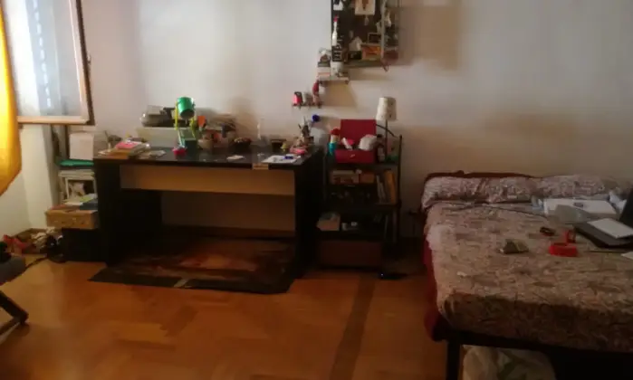 Rexer-Roma-Affittasi-ampia-stanza-singola-CAMERA-DA-LETTO