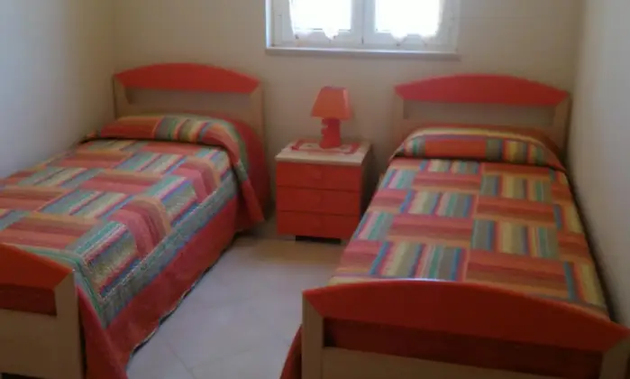 Rexer-policoro-Villetta-elegante-con-Veranda-affaccio-piscina-CAMERA-DA-LETTO
