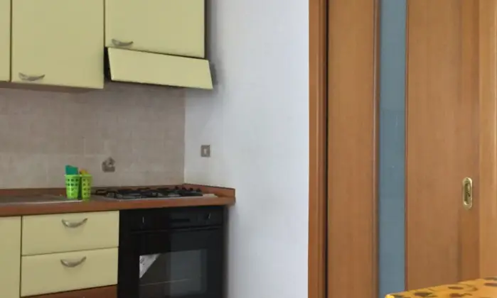 Rexer-Napoli-Camera-spaziosa-Internet-Fibra-WiFi-arredata-balconi-per-studentessa-CUCINA
