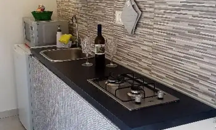 Rexer-La-Spezia-Bilocale-con-spazio-esterno-CUCINA