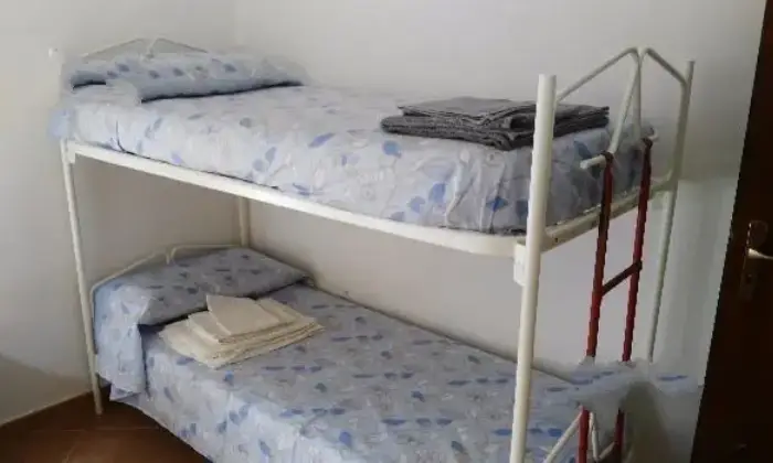 Rexer-Custonaci-Camera-singola-in-una-villetta-CAMERA-DA-LETTO