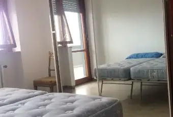 Rexer-Pescara-Camere-in-Attico-spazioso-CAMERA-DA-LETTO