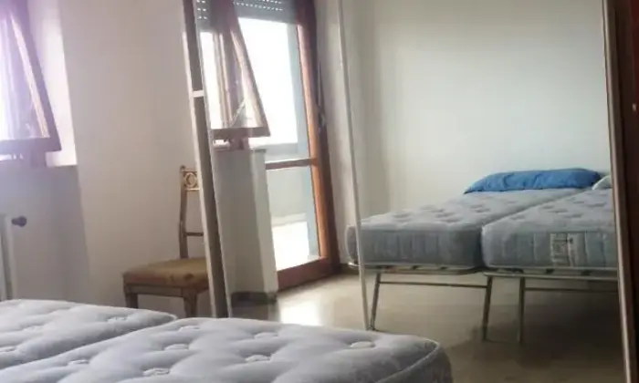 Rexer-Pescara-Camere-in-Attico-spazioso-CAMERA-DA-LETTO