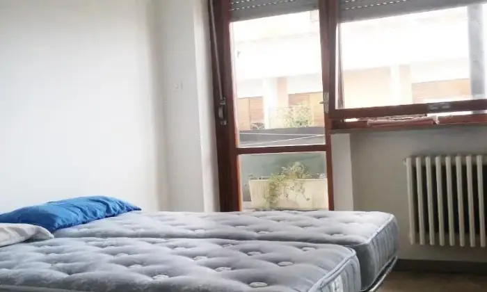 Rexer-Pescara-Camere-in-Attico-spazioso-CAMERA-DA-LETTO