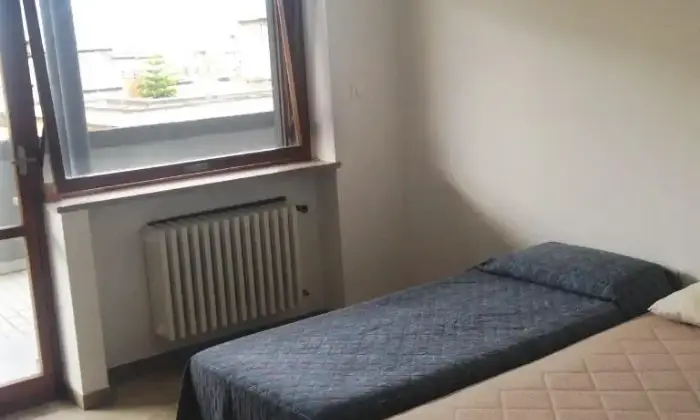 Rexer-Pescara-Camere-in-Attico-spazioso-CAMERA-DA-LETTO