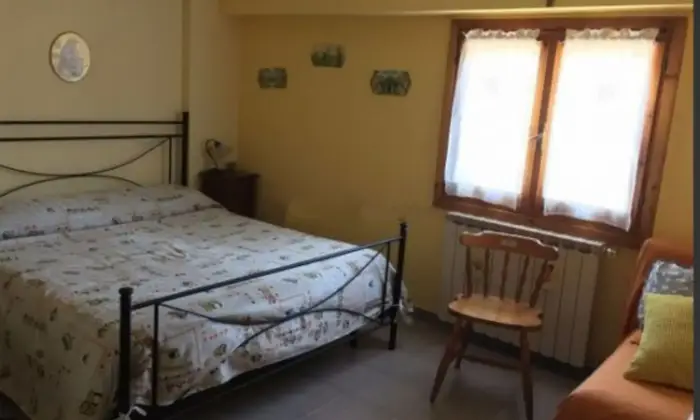 Rexer-Campo-di-Giove-Affitto-di-Attico-in-via-del-Lago-Campo-di-Giove-CAMERA-DA-LETTO