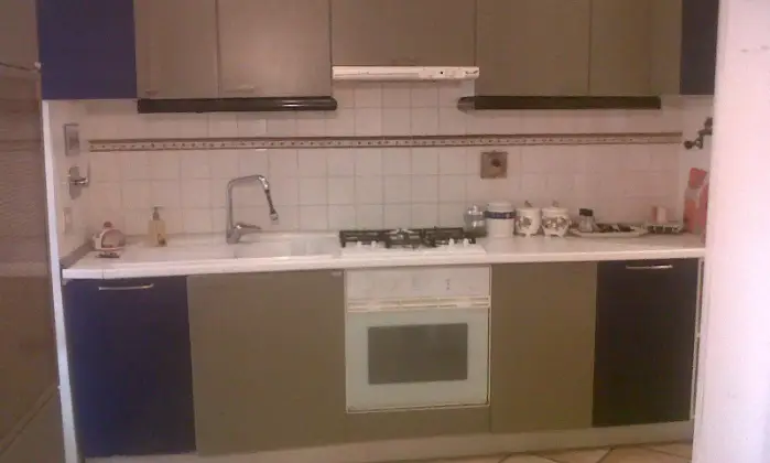 Rexer-Roma-Stanza-con-bagno-singolo-in-appartamento-arredato-zona-Talenti-CUCINA