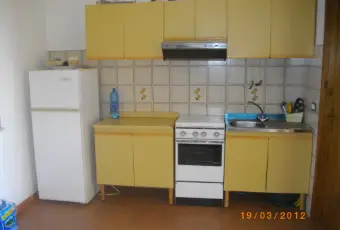 Rexer-Bonifati-Appartamento-vista-mare-angolo-cottura