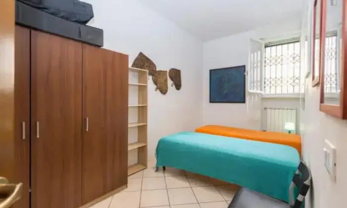 Rexer-Roma-Appartamento-camere-da-letto-metropolitana-Colli-Albani-CAMERA-DA-LETTO