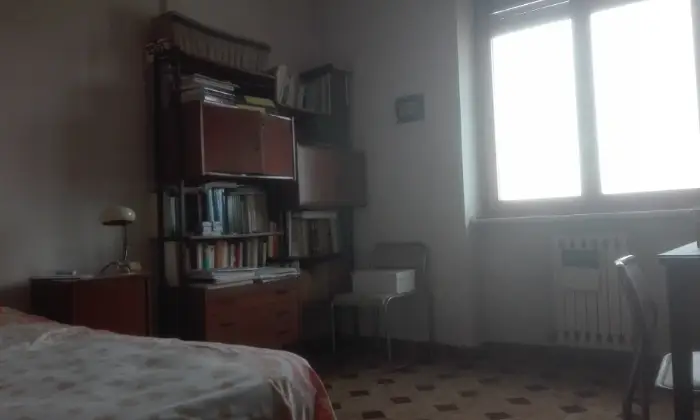 Rexer-Cosenza-Appartamento-con-tre-bagni-e-vista-panoramica-CAMERA-DA-LETTO