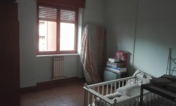 Rexer-Cosenza-Appartamento-con-tre-bagni-e-vista-panoramica-CAMERA-DA-LETTO
