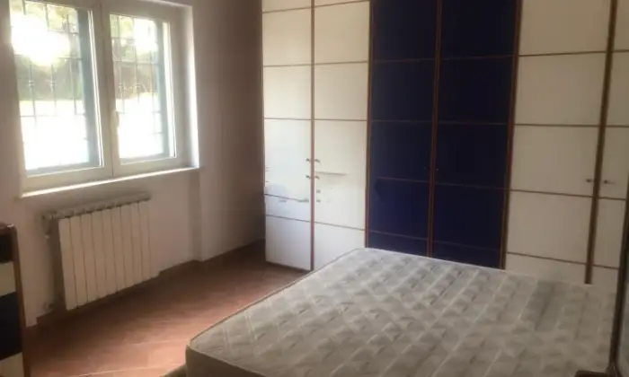 Rexer-Roma-Bilocale-in-affitto-in-via-Giuseppe-Molteni-CAMERA-DA-LETTO