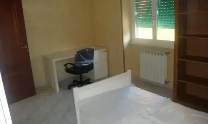 Rexer-Roma-Camera-singola-CAMERA-DA-LETTO
