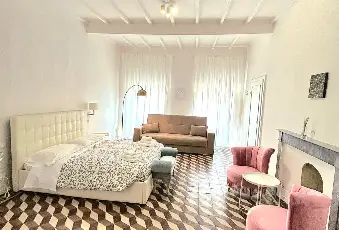 Rexer-Arezzo-Appartamento-brevi-periodi-Arezzo-CameraDaLetto