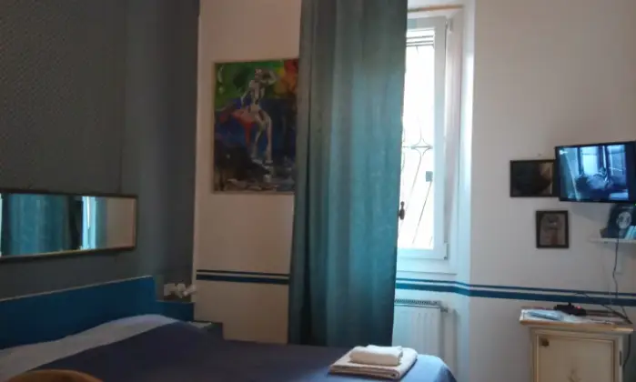 Rexer-Venezia-Alloggio-bilocale-di-fronte-Padiglioni-Biennale-a-Venezia-CameraDaLetto