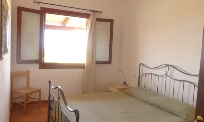 Rexer-San-Teodoro-San-Teodoro-appartamento-con-splendida-vista-mare-CAMERA-DA-LETTO
