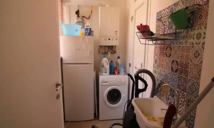 Rexer-Roma-Stanza-singola-con-letto-matrimoniale-CUCINA