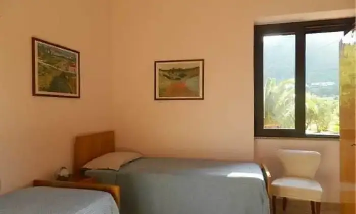 Rexer-Cardedu-Vacanze-da-sogno-in-villa-lussuosa-con-giardino-CAMERA-DA-LETTO