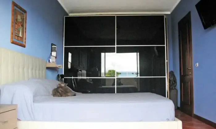 Rexer-Roma-Appartamento-luminosissimo-con-posto-auto-e-cantina-CAMERA-DA-LETTO