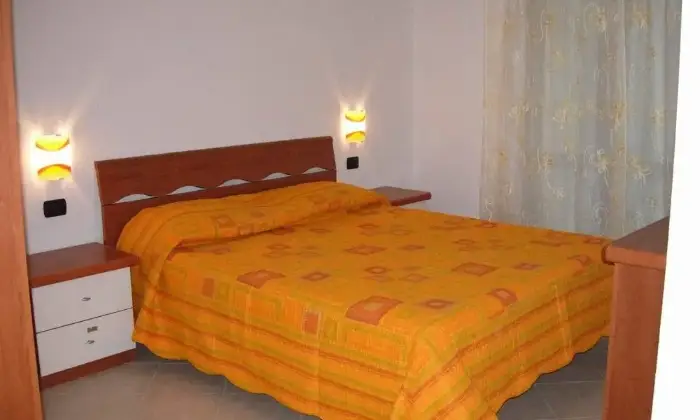 Rexer-Gonnesa-AQppartamento-confortevole-per-una-vacanza-stupenda-CAMERA-DA-LETTO