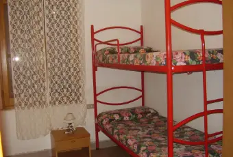 Rexer-Tertenia-Villette-a-schiera-a-mt-dal-mare-CAMERA-DA-LETTO