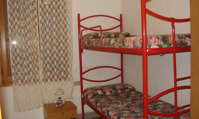Rexer-Tertenia-Villette-a-schiera-a-mt-dal-mare-CAMERA-DA-LETTO