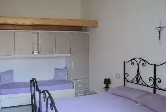 Rexer-Villasimius-Appartamento-bilocale-e-trilocale-in-Villasimius-CAMERA-DA-LETTO